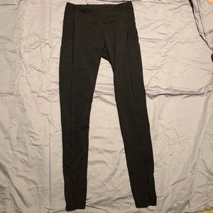 Lululemon black medium rise full length leggings with pockets and mesh on calf